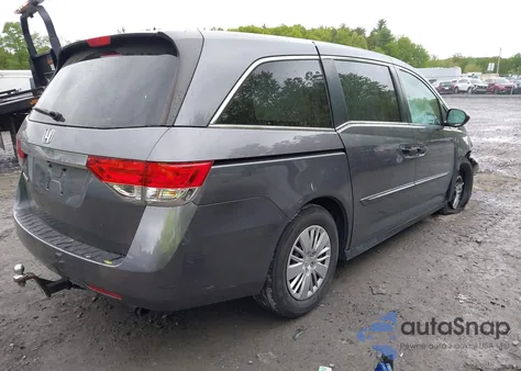 2014 Honda Odyssey Lx z USA, uszkodzony, nr VIN 5FNRL5H24EB129725